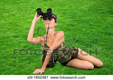 young woman in sexy military uniform with binoculars View Large Photo Image Stock Photo - young woman in sexy military uniform with binoculars. Fotosearch