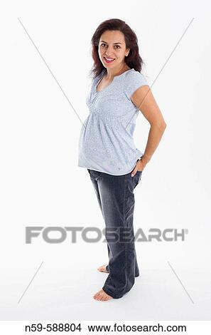Young woman in the early stages of pregnancy View Large Photo Image Picture - Young woman in the early stages of pregnancy. Fotosearch