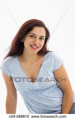 Young woman in the early stages of pregnancy View Large Photo Image Stock Image - Young woman in the early stages of pregnancy. Fotosearch