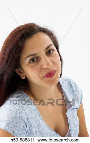 Stock Image - Young woman in the early stages of pregnancy. Fotosearch
