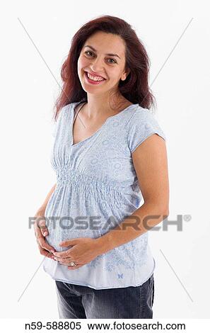 Young woman in the early stages of pregnancy View Large Photo Image Stock Photography - Young woman in the early stages of pregnancy. Fotosearch