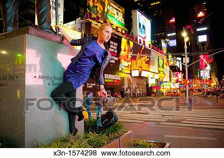 Young woman in Times Square New York View Large Photo Image Stock Photo - Young woman in Times Square New York. Fotosearch