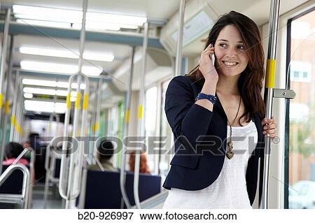 Young woman in tram, Vitoria, Alava, Basque Country, Spain View Large Photo Image Stock Photo - Young woman in tram, Vitoria, Alava, Basque Country, Spain. Fotosearch