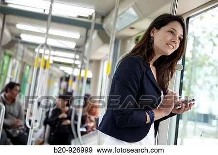 Young woman in tram, Vitoria, Alava, Basque Country, Spain View Large Photo Image Stock Photo - Young woman in tram, Vitoria, Alava, Basque Country, Spain. Fotosearch