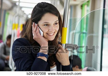 Young woman in tram, Vitoria, Alava, Basque Country, Spain View Large Photo Image Stock Photo - Young woman in tram, Vitoria, Alava, Basque Country, Spain. Fotosearch