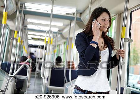 Young woman in tram, Vitoria, Alava, Basque Country, Spain View Large Photo Image Stock Photograph - Young woman in tram, Vitoria, Alava, Basque Country, Spain. Fotosearch