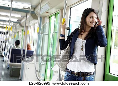 Young woman in tram, Vitoria, Alava, Basque Country, Spain View Large Photo Image Stock Photography - Young woman in tram, Vitoria, Alava, Basque Country, Spain. Fotosearch