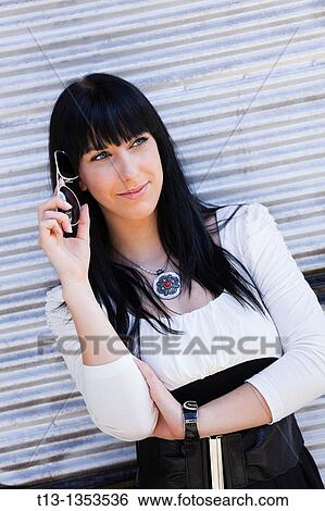 Young woman is thinking View Large Photo Image Stock Photograph - Young woman is thinking. Fotosearch