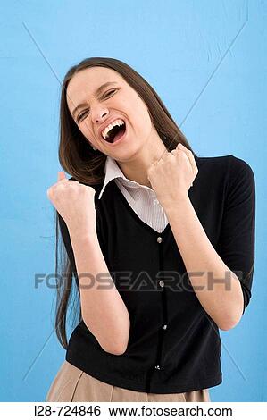 Young woman laughing, eyes closed View Large Photo Image Stock Photograph - Young woman laughing, eyes closed. Fotosearch