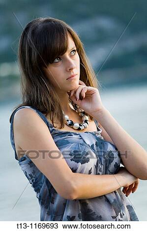 Young woman lonesome View Large Photo Image Stock Image - Young woman lonesome. Fotosearch