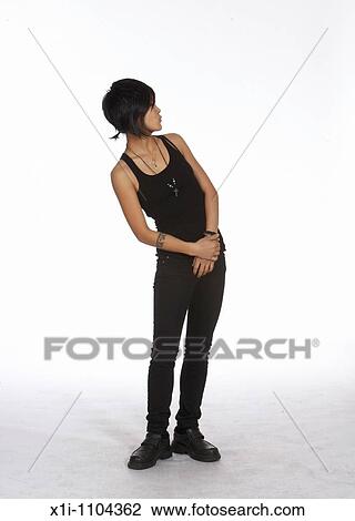 Stock Image - Young woman looking aside. Fotosearch