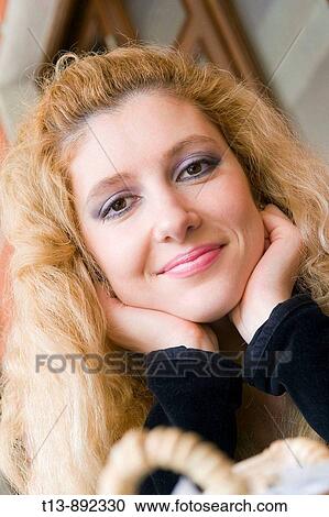 Young woman looking at camera portrait View Large Photo Image Stock Image - Young woman looking at camera portrait. Fotosearch