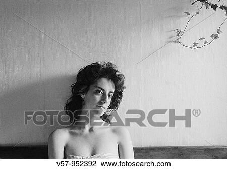 Young woman looking at the camera. Black and white. View Large Photo Image Stock Image - Young woman looking at the camera. Black and white.. Fotosearch
