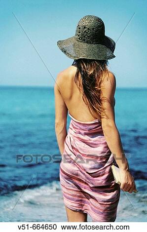Young woman looking to the sea. View Large Photo Image Stock Image - Young woman looking to the sea.. Fotosearch