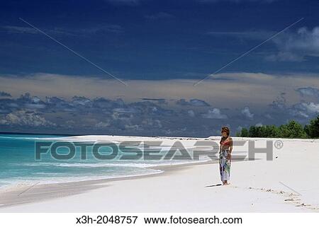 young woman on a beach of Bird Island, Republic of Seychelles, Indian Ocean View Large Photo Image Stock Photo - young woman on a beach of Bird Island, Republic of Seychelles, Indian Ocean. Fotosearch