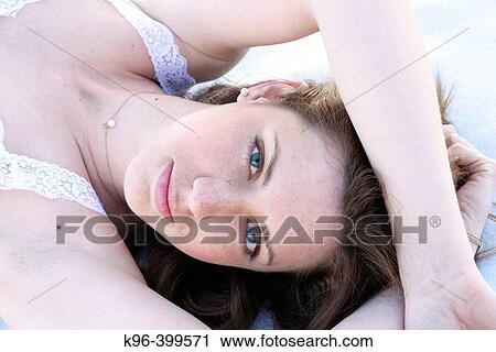 young woman on beach View Large Photo Image Stock Image - young woman on beach. Fotosearch