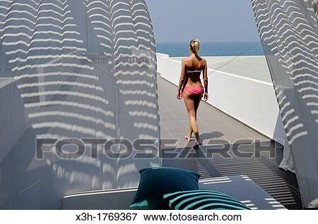 young woman on the spa terrace of the Almyra Luxury Spa Hotel, Paphos, Cyprus, Eastern Mediterranean Sea View Large Photo Image Stock Photo - young woman on the spa terrace of the Almyra Luxury Spa Hotel, Paphos, Cyprus, Eastern Mediterranean Sea. Fotosearch