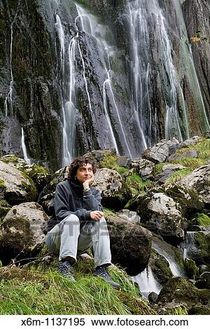 Young woman outdoor Ason river source Collados del Ason Natural Park Cantabria, Spain, Europe View Large Photo Image Stock Photography - Young woman outdoor Ason river source Collados del Ason Natural Park Cantabria, Spain, Europe. Fotosearch