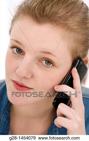 Young woman phoning View Large Photo Image Stock Photo - Young woman phoning. Fotosearch