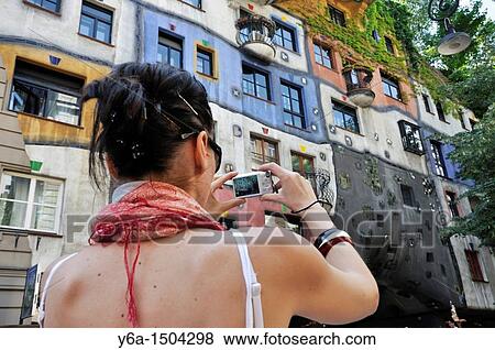 Young woman photographing Hundertwasser House, Vienna, Austria View Large Photo Image Stock Photo - Young woman photographing Hundertwasser House, Vienna, Austria. Fotosearch