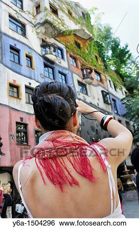 Young woman photographing Hundertwasser House, Vienna, Austria View Large Photo Image Stock Photograph - Young woman photographing Hundertwasser House, Vienna, Austria. Fotosearch
