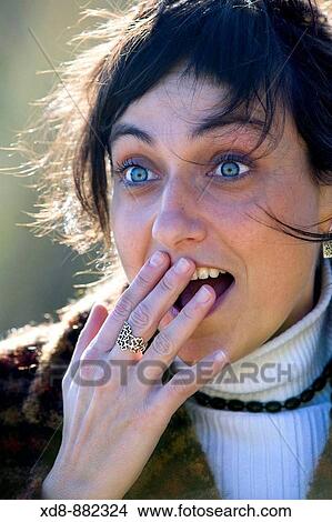 Young woman portrait in a surprised grimace View Large Photo Image Picture - Young woman portrait in a surprised grimace. Fotosearch
