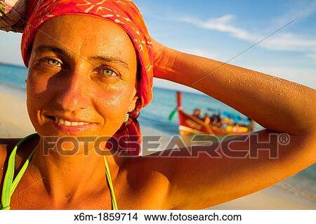 Young woman portrait Long beach Phi Phi Don island Krabi province, Andaman Sea, Thailand View Large Photo Image Picture - Young woman portrait Long beach Phi Phi Don island Krabi province, Andaman Sea, Thailand. Fotosearch