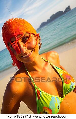 Stock Image - Young woman portrait Long beach Phi Phi Don island Krabi province, Andaman Sea, Thailand. Fotosearch