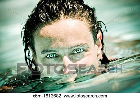 Young woman portrait on a swimming pool View Large Photo Image Stock Image - Young woman portrait on a swimming pool. Fotosearch