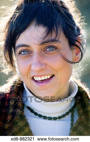 Young woman portrait smiling View Large Photo Image Stock Image - Young woman portrait smiling. Fotosearch