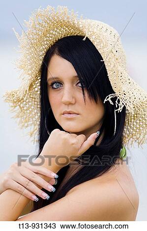 Young woman portrait with Summer hat View Large Photo Image Stock Image - Young woman portrait with Summer hat. Fotosearch