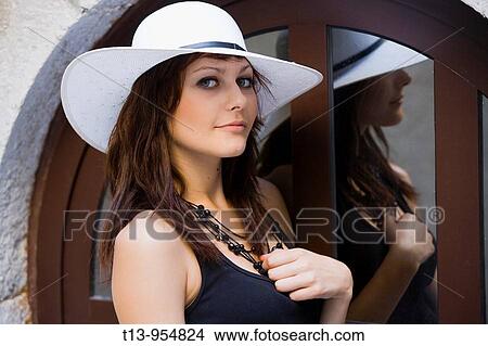 Young woman portrait with White hat View Large Photo Image Picture - Young woman portrait with White hat. Fotosearch