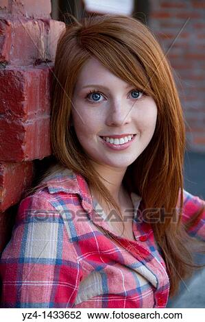 Stock Image - Young Woman Posing in Casual Clothes. Fotosearch