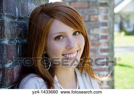Stock Image - Young Woman Posing in Casual Clothes. Fotosearch