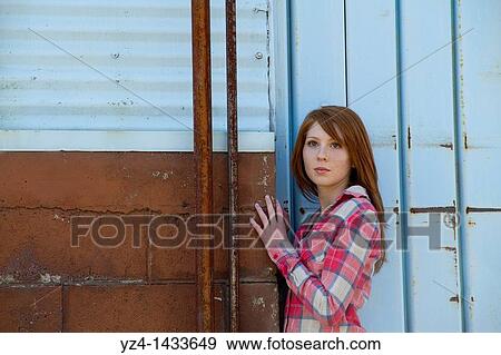 Young Woman Posing in Casual Clothes View Large Photo Image Stock Photo - Young Woman Posing in Casual Clothes. Fotosearch