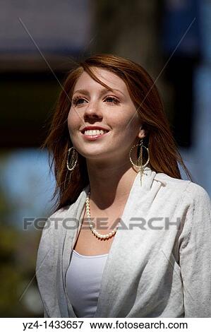 Stock Photo - Young Woman Posing in Casual Clothes. Fotosearch