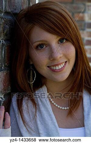 Stock Photo - Young Woman Posing in Casual Clothes. Fotosearch