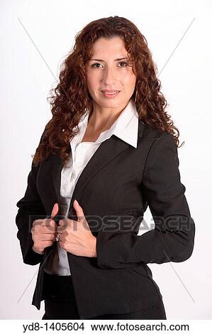 Young woman posing in the studio as an executive View Large Photo Image Picture - Young woman posing in the studio as an executive. Fotosearch