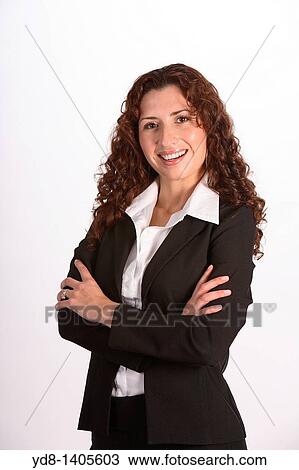 Young woman posing in the studio as an executive View Large Photo Image Stock Image - Young woman posing in the studio as an executive. Fotosearch