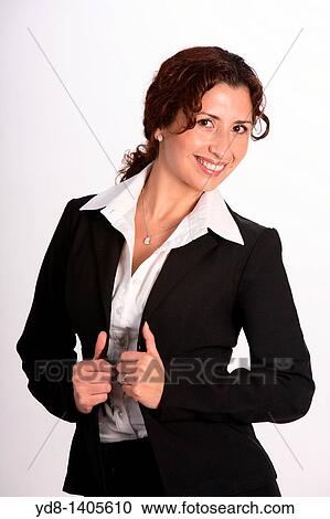 Young woman posing in the studio as an executive. View Large Photo Image Stock Image - Young woman posing in the studio as an executive.. Fotosearch