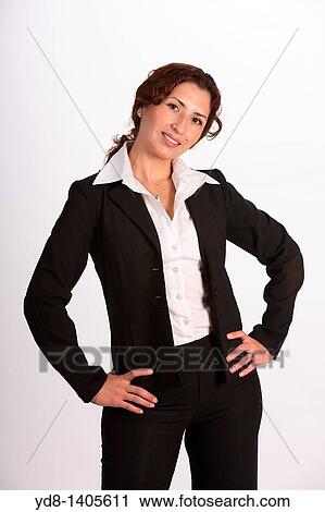 Young woman posing in the studio as an executive. View Large Photo Image Stock Image - Young woman posing in the studio as an executive.. Fotosearch