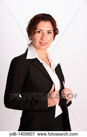 Young woman posing in the studio as an executive. View Large Photo Image Stock Photo - Young woman posing in the studio as an executive.. Fotosearch