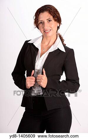 Young woman posing in the studio as an executive. View Large Photo Image Stock Photo - Young woman posing in the studio as an executive.. Fotosearch