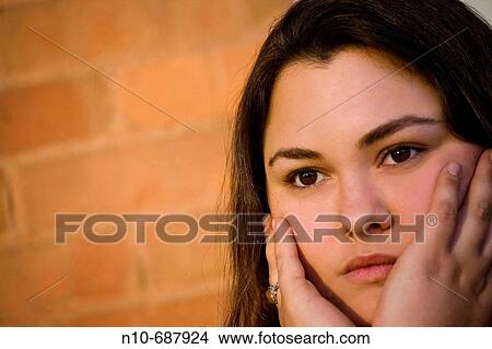 Young woman posing. View Large Photo Image Picture - Young woman posing.. Fotosearch