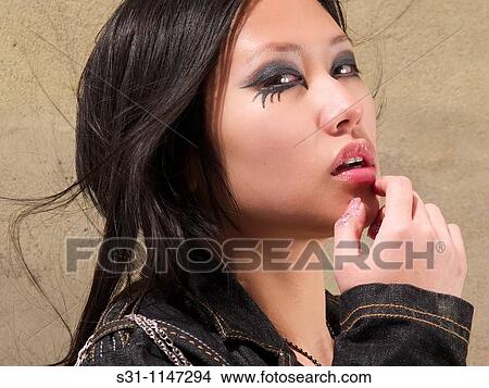 Picture - young woman posing. Fotosearch