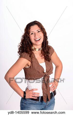Young woman posing smailing and looking at the camera View Large Photo Image Stock Photo - Young woman posing smailing and looking at the camera. Fotosearch