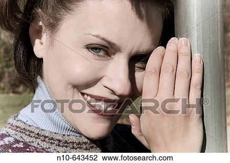 Stock Image - Young woman posing.. Fotosearch
