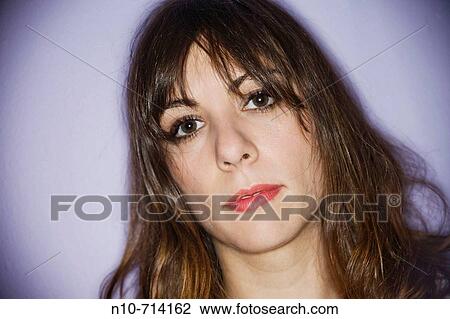 Young woman posing View Large Photo Image Stock Image - Young woman posing. Fotosearch