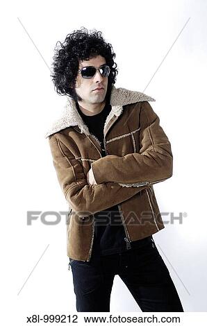 Stock Image - Young woman posing. Fotosearch