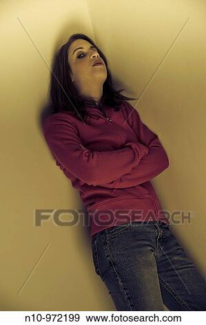 Young woman posing View Large Photo Image Stock Photo - Young woman posing. Fotosearch